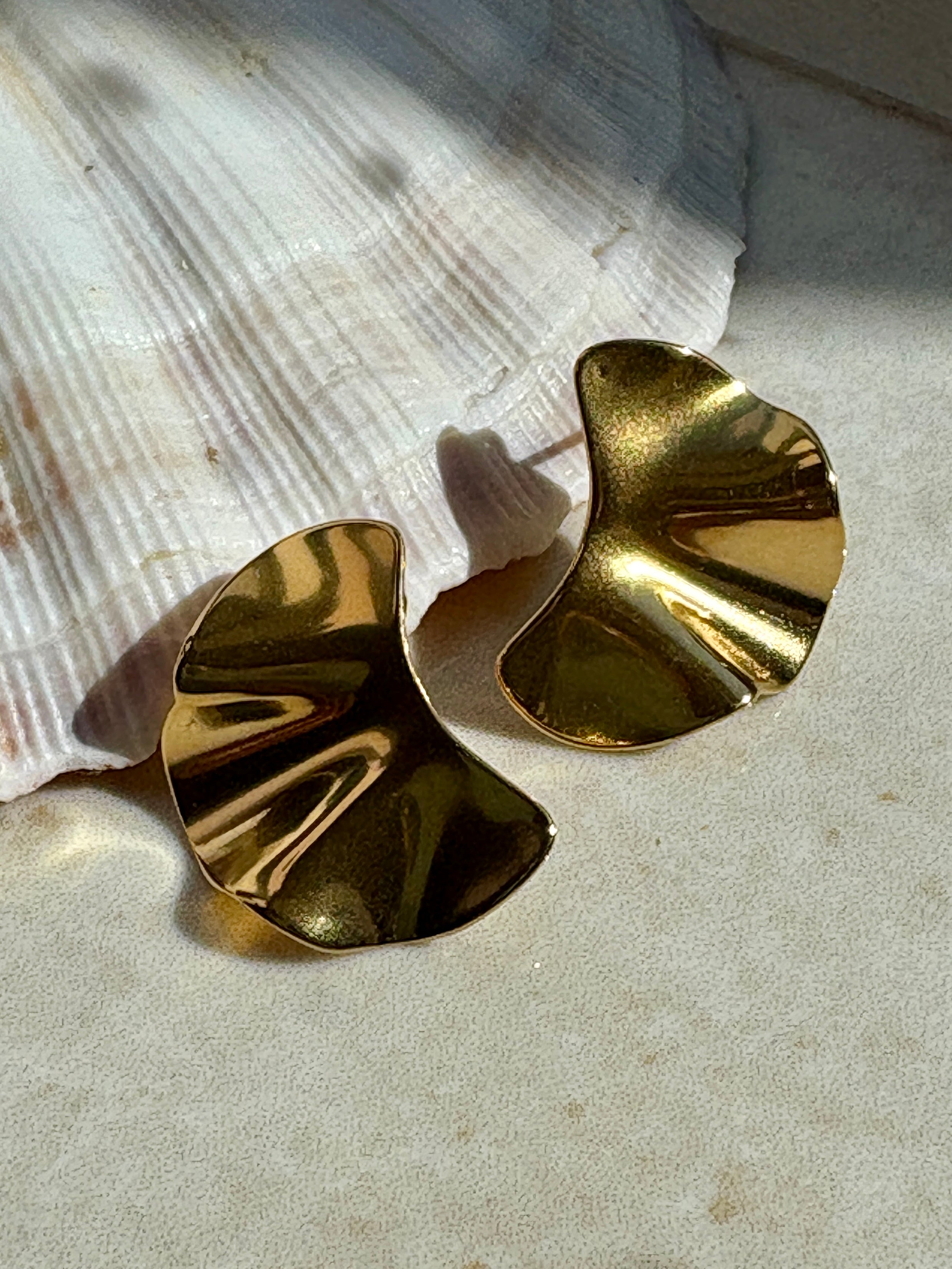 Bold gold fan earrings with flowing sculptural folds, 18k gold plated stainless steel,