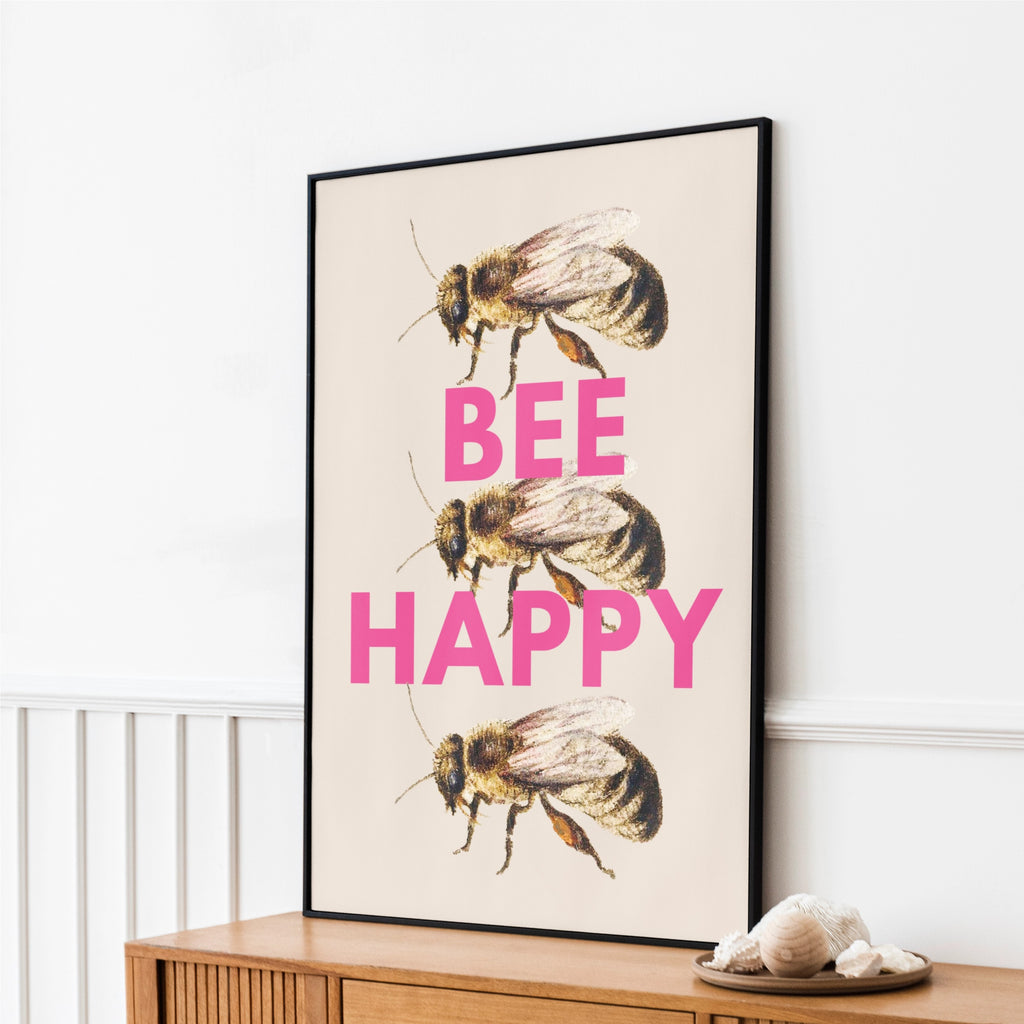 Framed artwork with bees and 'BEE HAPPY' vintage bees