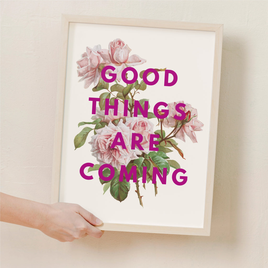 Framed print with pink roses and 'Good Things Are Coming' text. Floral print gift 
