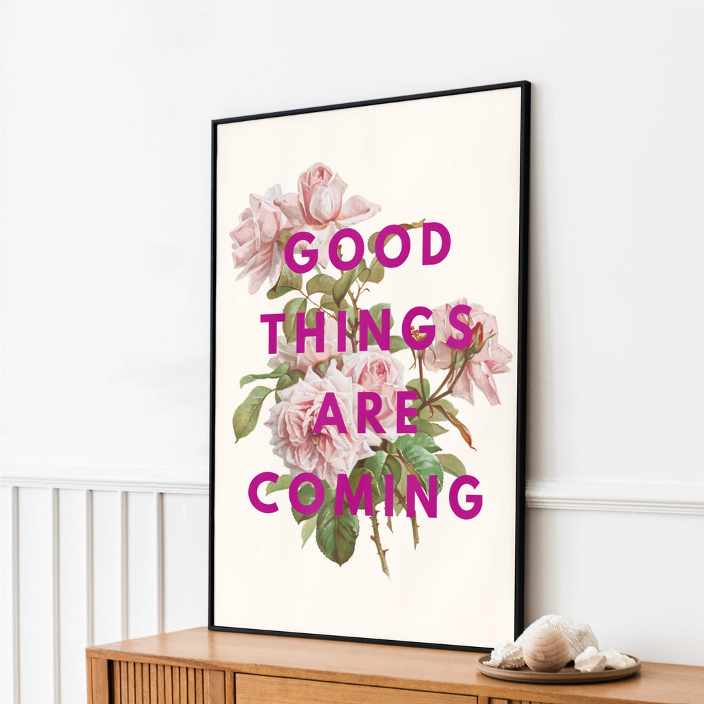 Floral print with the words good things are coming vintage roses