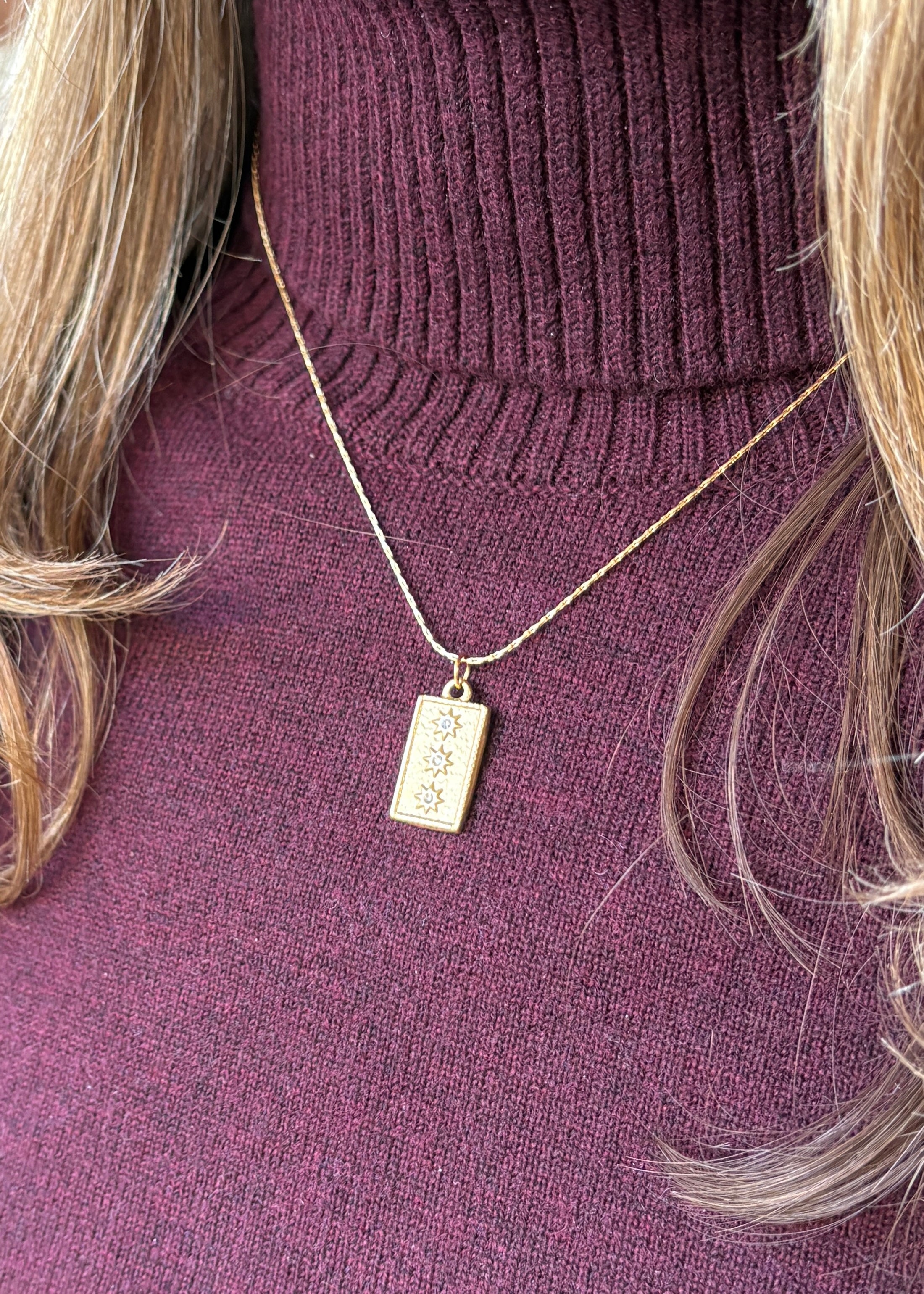 Gold Textured Rectangular Pendant Necklace with 3 Star Accents