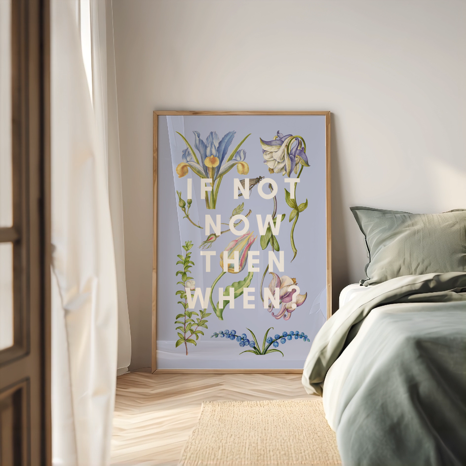 Framed botanical art print with motivational quote in a bedroom setting