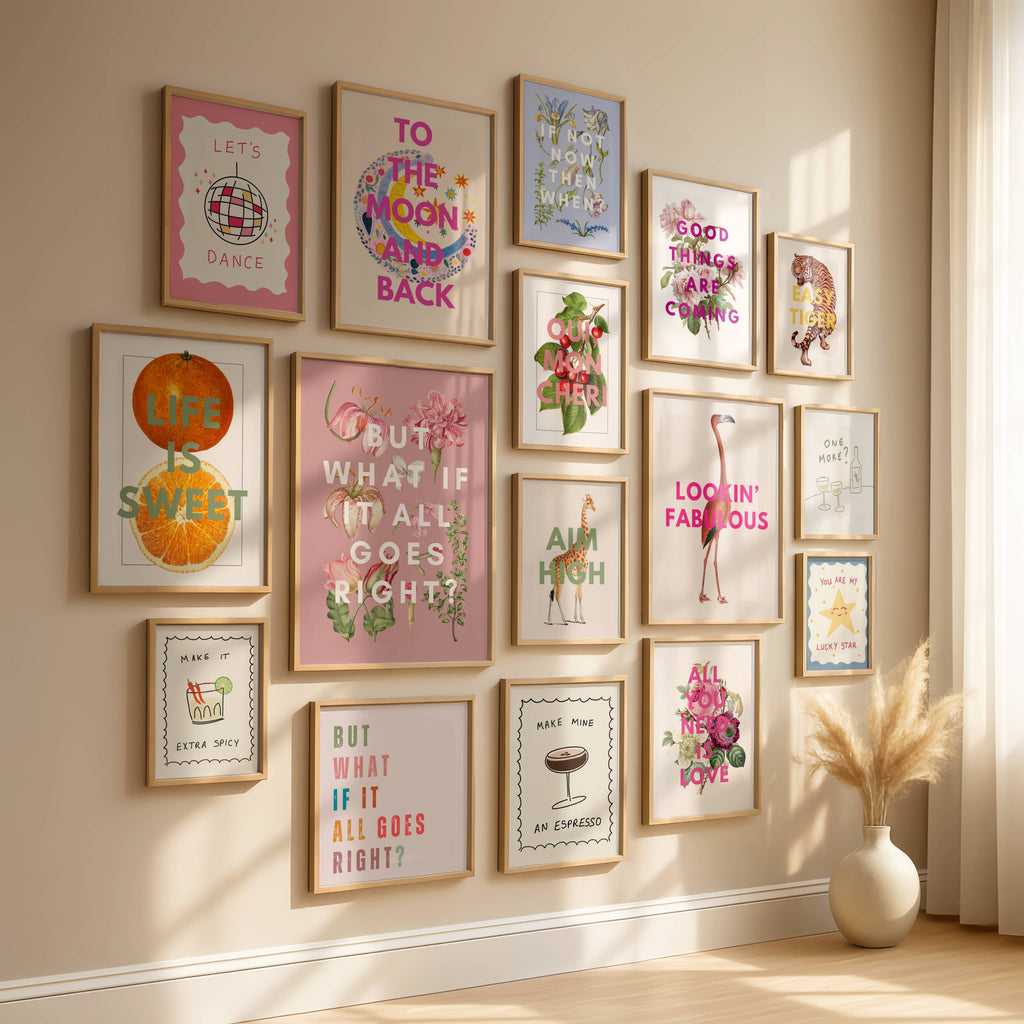 Wall with framed colorful art prints in a home setting