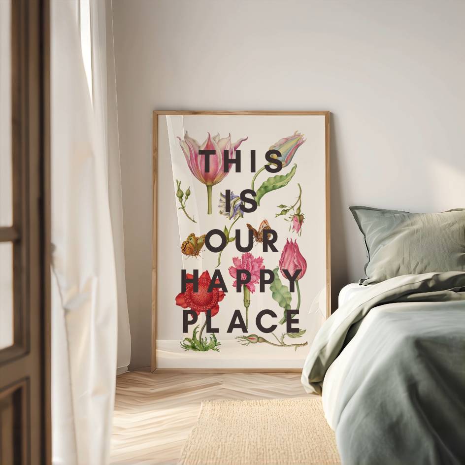 Framed artwork with floral design and text in a bedroom setting