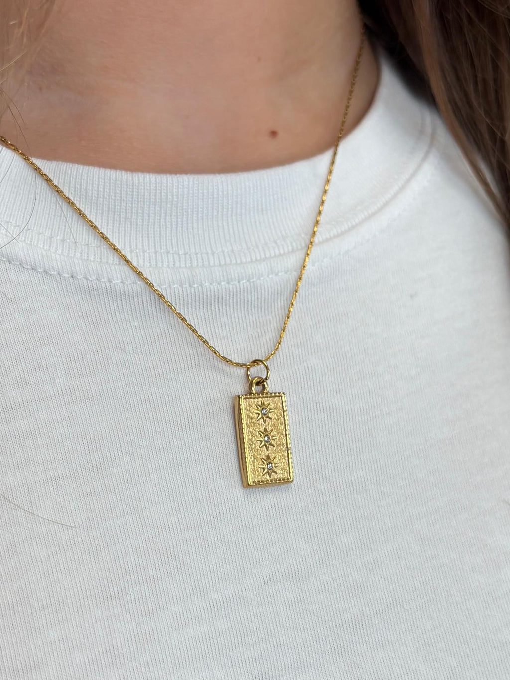 Gold Textured Rectangular Pendant Necklace with 3 Star Accents