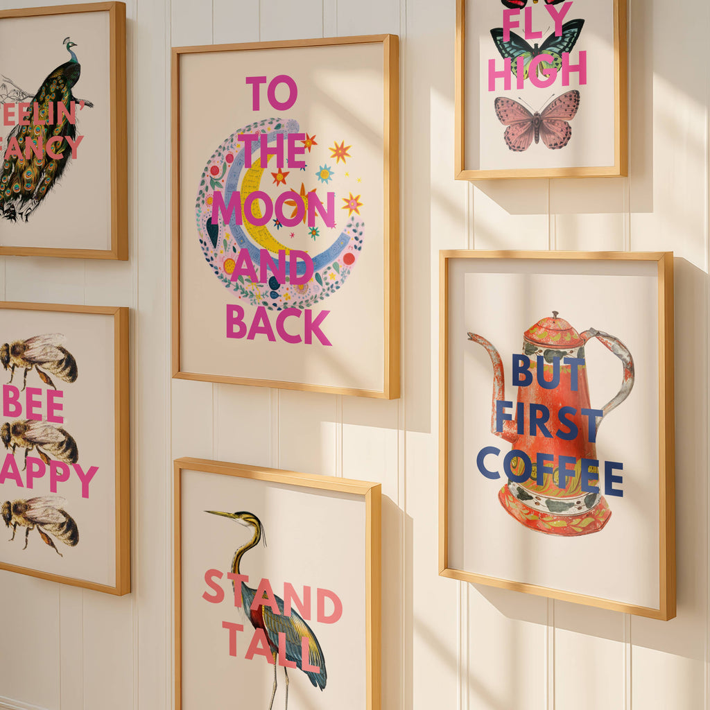 Framed prints with motivational phrases on a wall