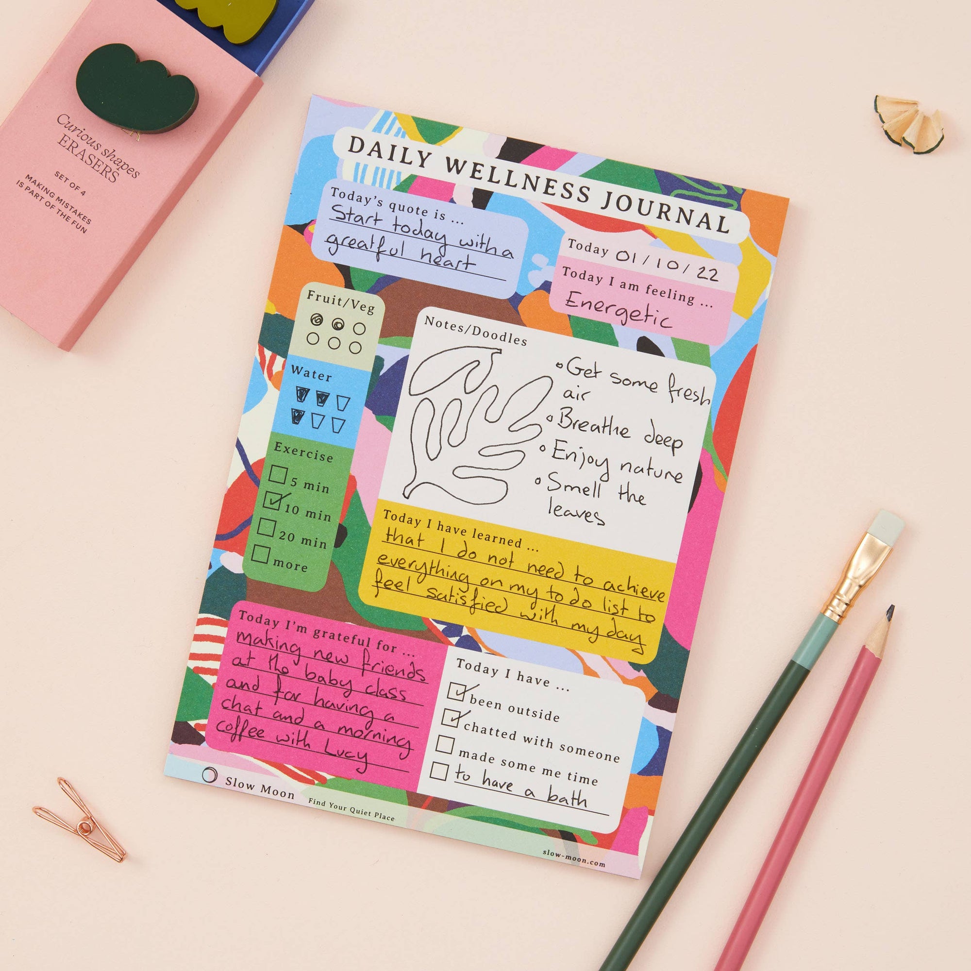 colourful journal with daily habits and tick lists notepad